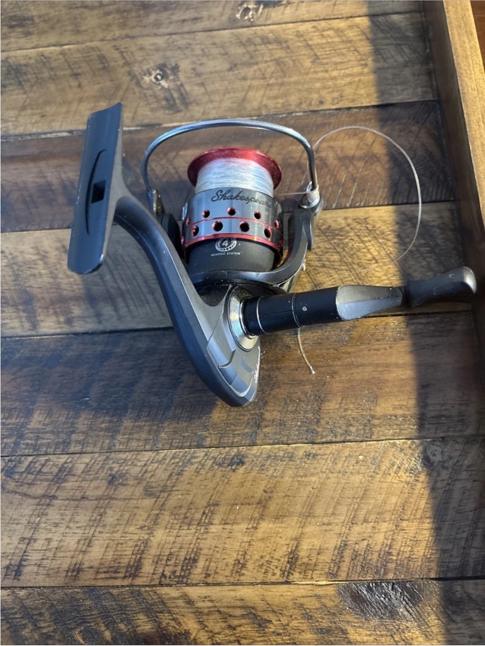 Shakespeare Red & Black Spinning Reel - Men’s Fishing Reel